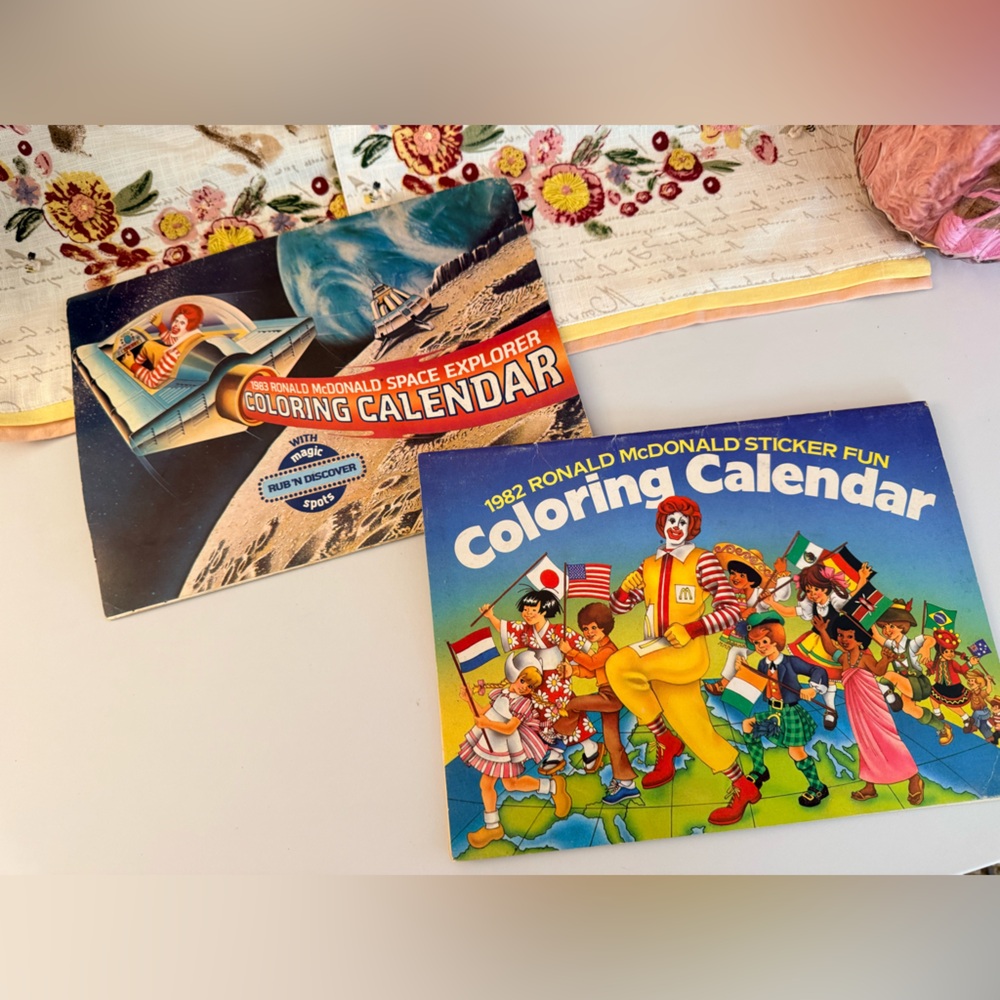 Vintage lot of two Ronald McDonald 1982/83 coloring book calendar